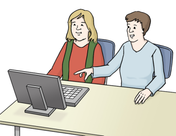 Zwei Menschen vor einem Computer