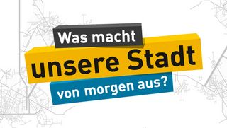 Schriftzug „Was macht unsere Stadt von morgen aus?"