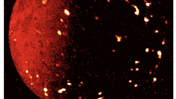 Ein dunkelroter Kreis mit vielen hell leuchtenden Flecken darauf.