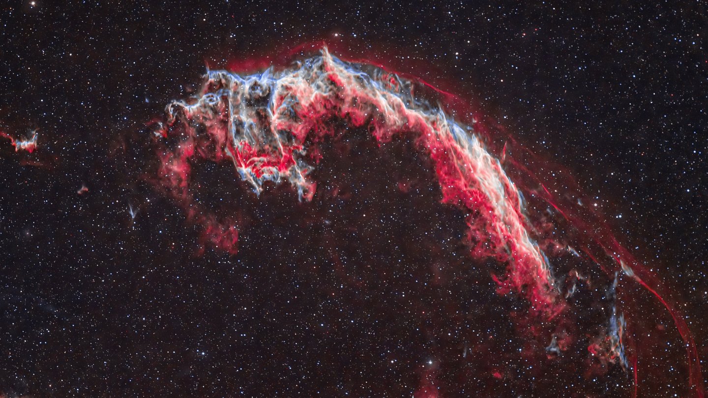 Neonfarbende, strahlenförmige Muster aus Sternen