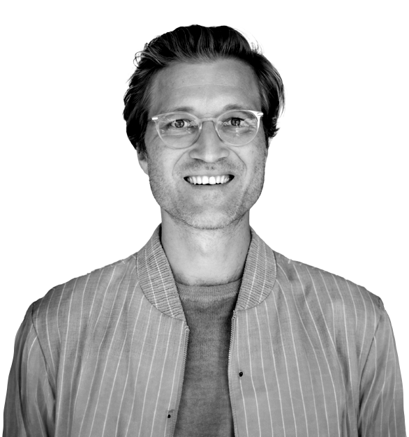 Portraitfoto von Dr. Benedikt Fecher.